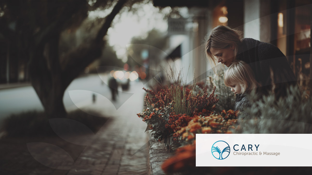 A mom and her daughter are picking fall flowers at a Cary downtown shop.
