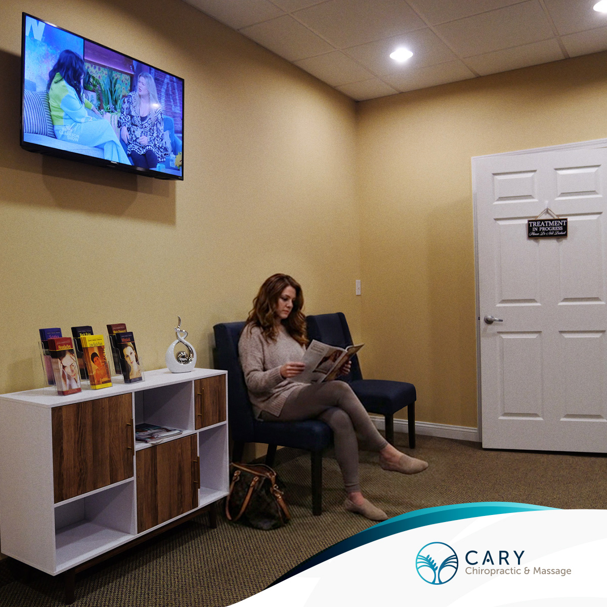 Woman waiting at the chiropractic waiting room